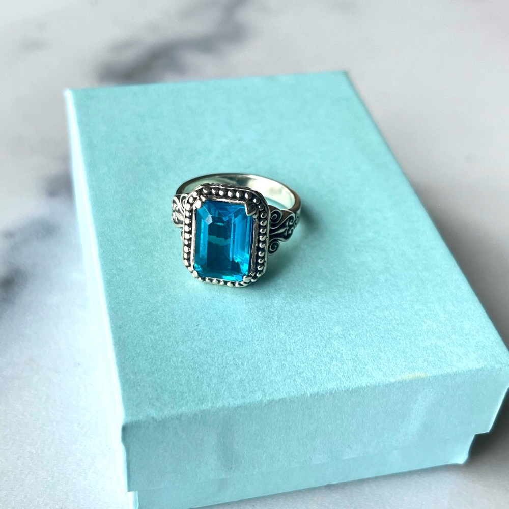 Emerald cut london blue topaz ring .. size 7